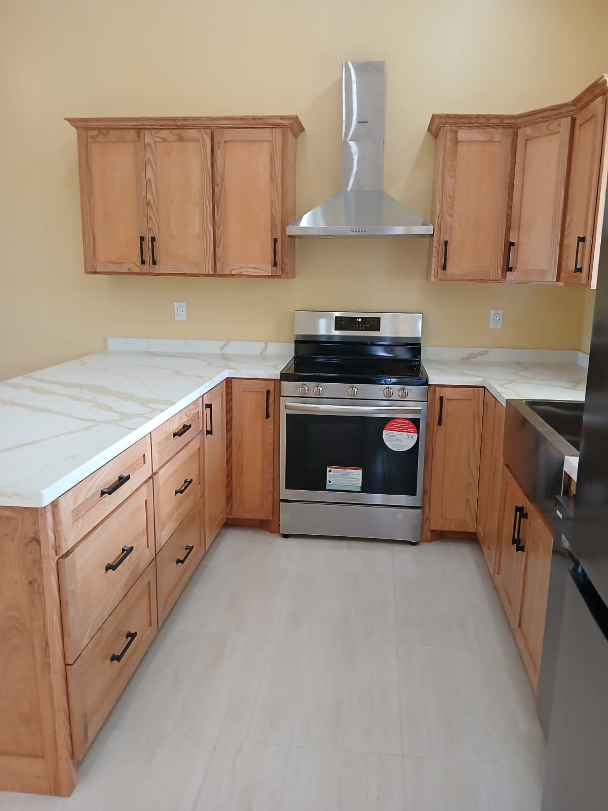 Custom natural wood kitchen cabinetry and drawers