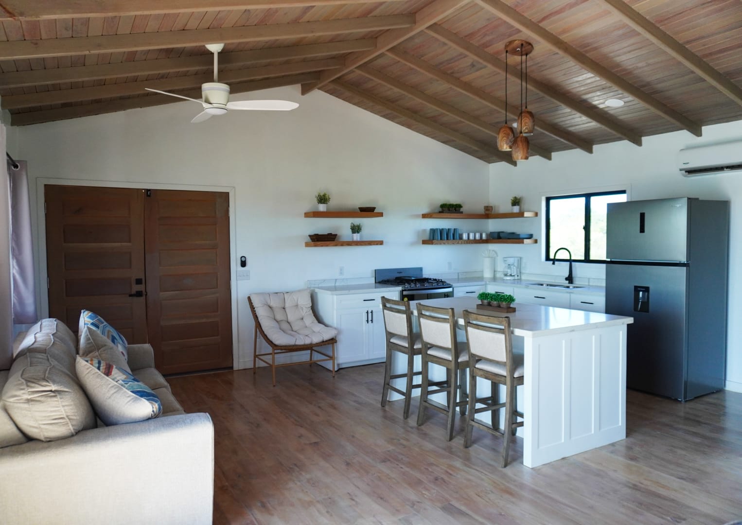 Open-plan interior with custom cabinetry and island