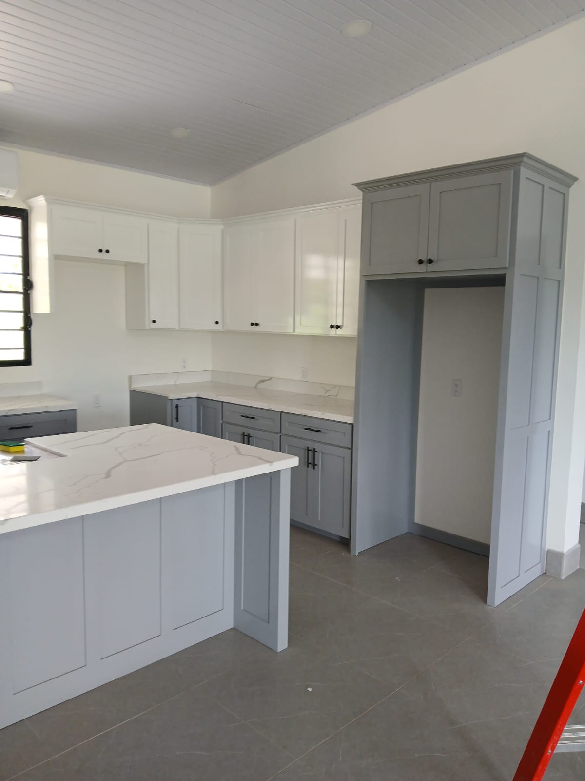 Custom built-in cabinetry and pantry surround
